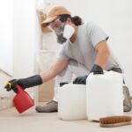 In,The,Home,Renovation,Site,Worker,Using,Products,For,Mold